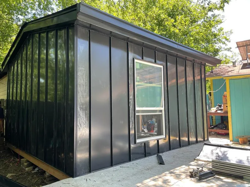 Black standing seam metal wall panels for Metal Roof Installation in Eden