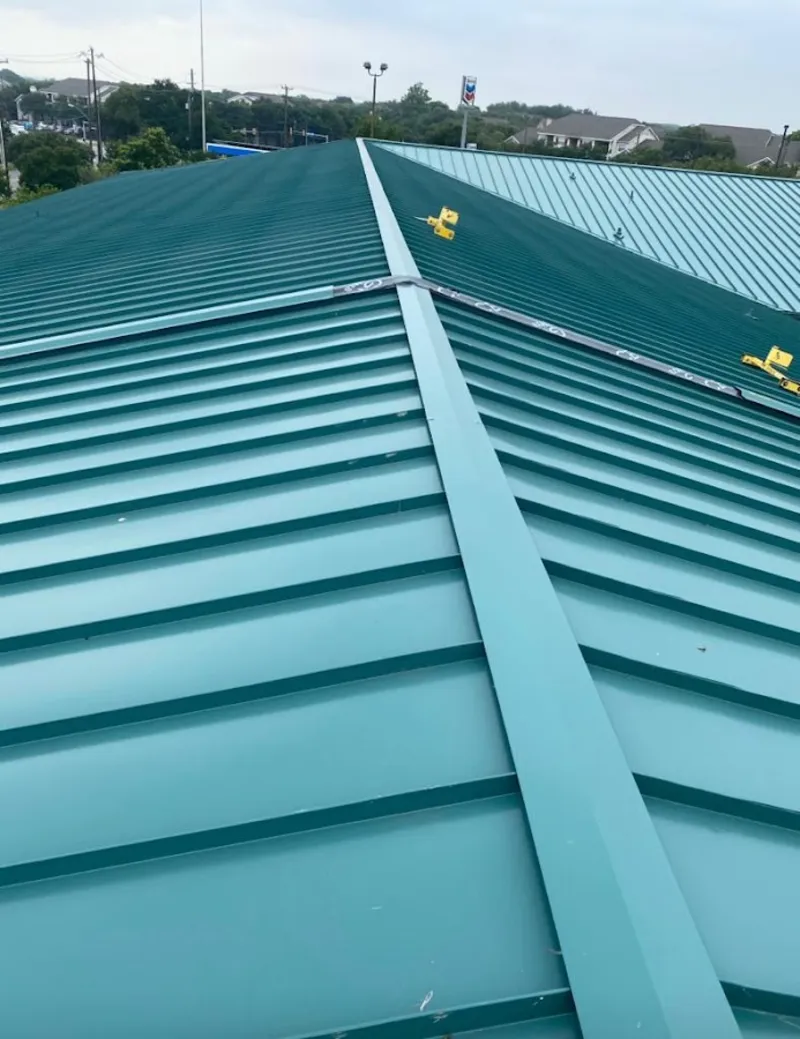 Green commercial metal roof ridge and valley for Metal Roof Repair in Eden